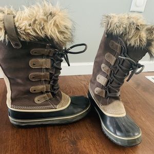 Brown and black sorrel boots